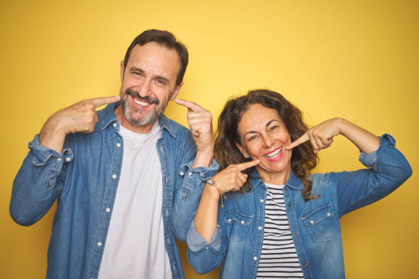 an elder couple showing-off radiant their smiles