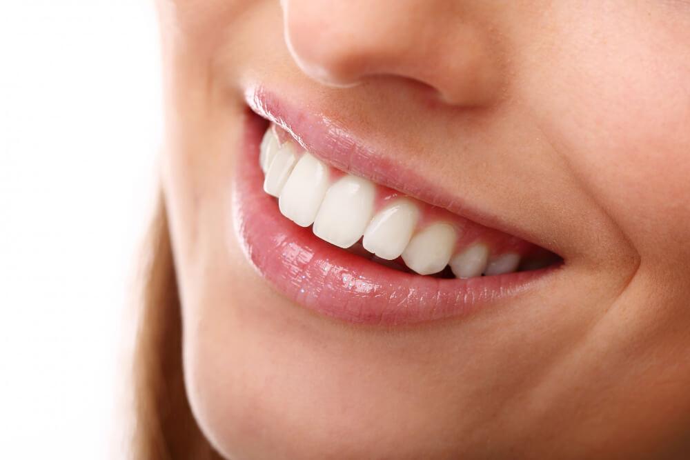 close-up shot of a woman's beautiful smile